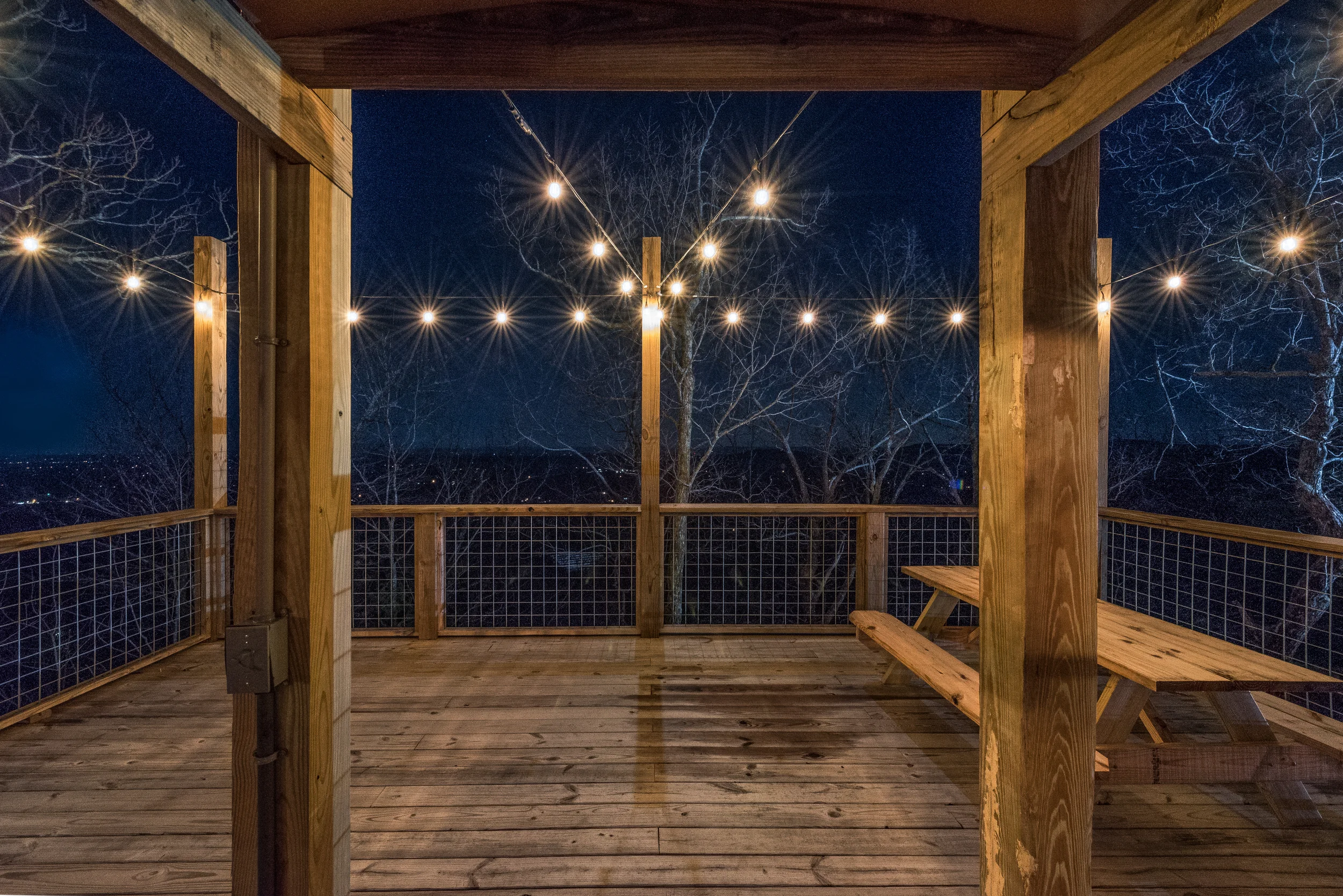 Yurt deck at night with lights